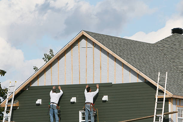 Professional Storm Damage Siding Repair technician working in Bloomfield, CT